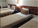 Habitación familiar con cama King y dos literas